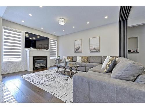 58 Curran Road, Hamilton, ON - Indoor Photo Showing Living Room With Fireplace