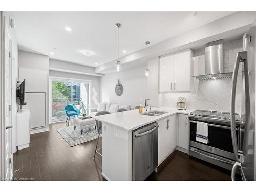 226-128 Grovewood Common, Oakville, ON - Indoor Photo Showing Kitchen With Double Sink With Upgraded Kitchen