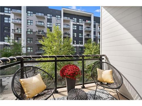 226-128 Grovewood Common, Oakville, ON - Outdoor With Balcony With Exterior