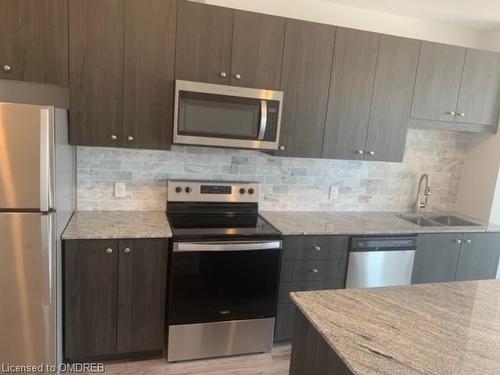 1602-104 Garment Street, Kitchener, ON - Indoor Photo Showing Kitchen With Double Sink With Upgraded Kitchen