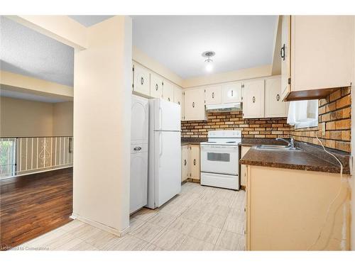 52-11 Harrisford Street, Hamilton, ON - Indoor Photo Showing Kitchen With Double Sink