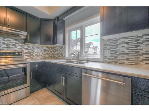 F2-70 Willowrun Drive, Kitchener, ON - Indoor Photo Showing Kitchen With Double Sink With Upgraded Kitchen