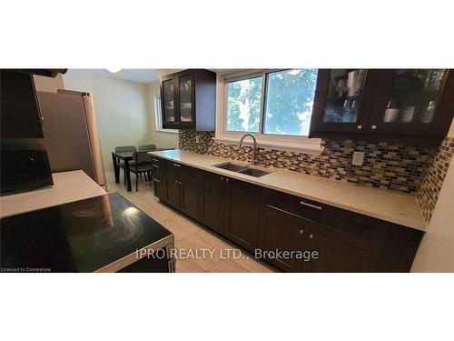 49-1310 Fieldlight Boulevard, Pickering, ON - Indoor Photo Showing Kitchen With Double Sink