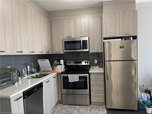 708-150 Main Street W, Hamilton, ON - Indoor Photo Showing Kitchen With Stainless Steel Kitchen With Double Sink With Upgraded Kitchen