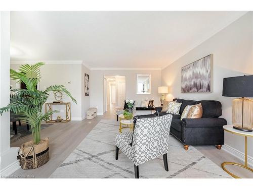 319-551 The West Mall, Toronto, ON - Indoor Photo Showing Living Room With Fireplace