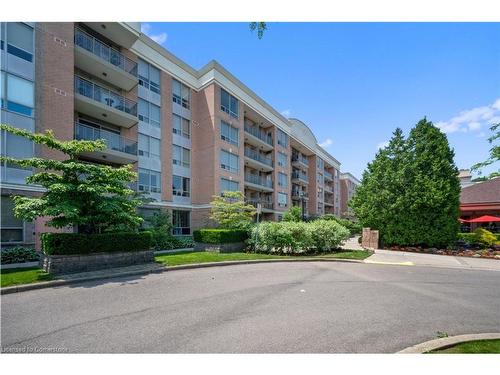 1215-100 Burloak Drive, Burlington, ON - Outdoor With Balcony With Facade