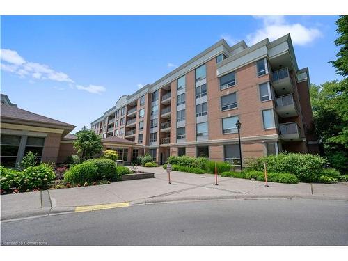 1215-100 Burloak Drive, Burlington, ON - Outdoor With Balcony With Facade