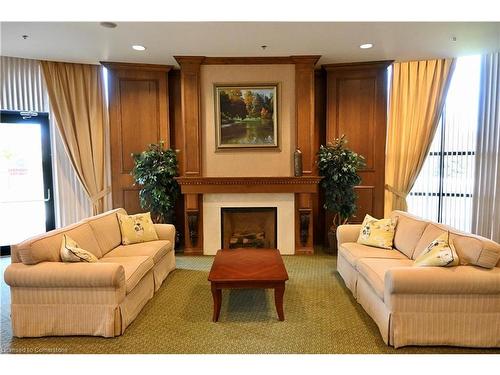 42-4 Tuscany Lane, Brampton, ON - Indoor Photo Showing Living Room With Fireplace