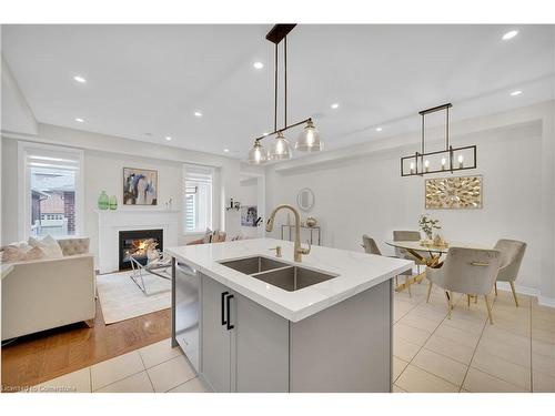 3079 Neyagawa Boulevard, Oakville, ON - Indoor Photo Showing Kitchen With Fireplace With Double Sink With Upgraded Kitchen