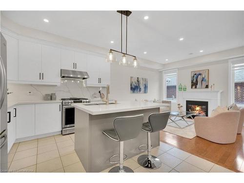 3079 Neyagawa Boulevard, Oakville, ON - Indoor Photo Showing Kitchen With Fireplace With Upgraded Kitchen