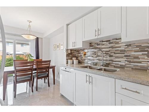 23-5230 Glen Erin Drive, Mississauga, ON - Indoor Photo Showing Kitchen With Double Sink