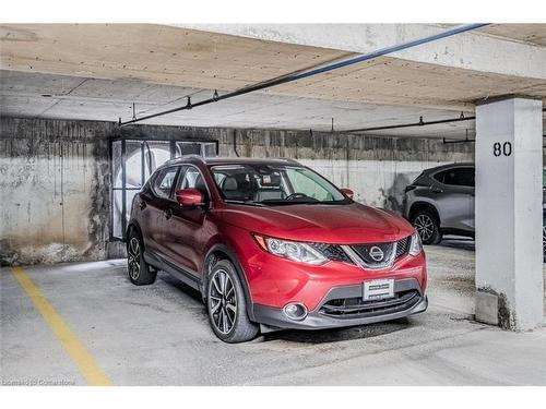 307-93 Westwood Road, Guelph, ON - Indoor Photo Showing Garage