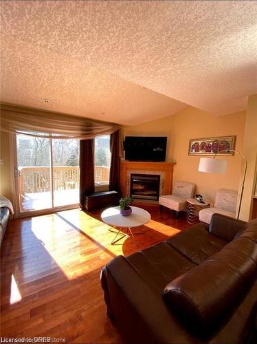 218 Dearborn Boulevard, Waterloo, ON - Indoor Photo Showing Living Room With Fireplace