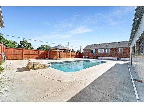 301 Christina Avenue, Hamilton, ON - Outdoor With In Ground Pool