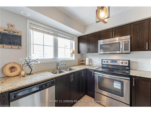 14-2480 Posts Road, Oakville, ON - Indoor Photo Showing Kitchen With Stainless Steel Kitchen With Double Sink