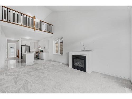 46 Dass Drive W, Centre Wellington, ON - Indoor With Fireplace