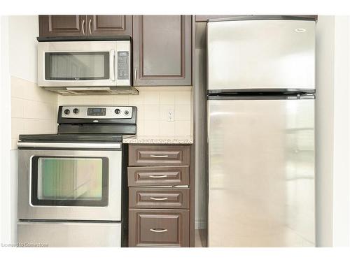 603-208 Enfield Place, Peel, ON - Indoor Photo Showing Kitchen