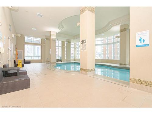 603-208 Enfield Place, Peel, ON - Indoor Photo Showing Other Room With In Ground Pool