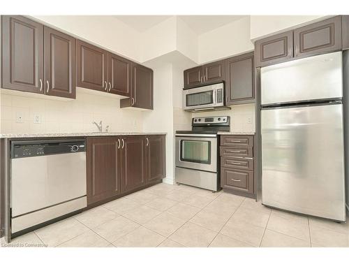 603-208 Enfield Place, Peel, ON - Indoor Photo Showing Kitchen With Stainless Steel Kitchen