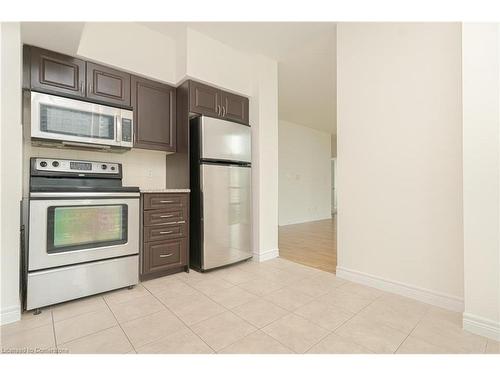 603-208 Enfield Place, Peel, ON - Indoor Photo Showing Kitchen With Stainless Steel Kitchen