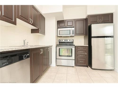 603-208 Enfield Place, Peel, ON - Indoor Photo Showing Kitchen With Stainless Steel Kitchen