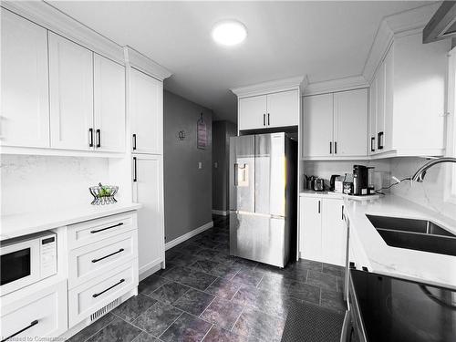 16 Dowden Avenue, Brantford, ON - Indoor Photo Showing Kitchen With Double Sink