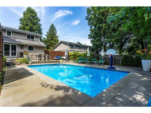 2150 Elmhurst Avenue, Oakville, ON - Outdoor With In Ground Pool With Deck Patio Veranda With Backyard