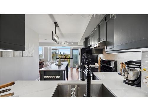 602-200 Burnhamthorpe Road E, Mississauga, ON - Indoor Photo Showing Kitchen With Double Sink