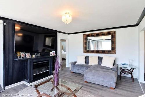 681 Crescent Road, Fort Erie, ON - Indoor Photo Showing Living Room With Fireplace