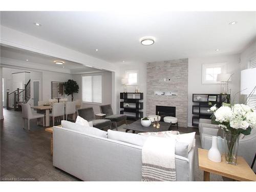 3025 Annalysse Drive, Orillia, ON - Indoor Photo Showing Living Room With Fireplace