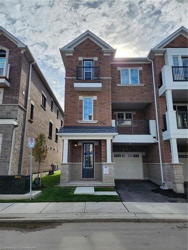 75-1317 Leriche Way, Milton, ON - Outdoor With Balcony With Facade