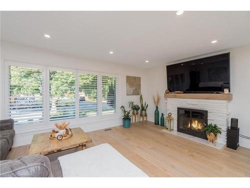 23 West Hampton Road, St. Catharines, ON - Indoor Photo Showing Living Room With Fireplace