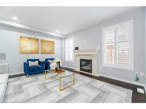 16 Burgess Crescent, Brantford, ON - Indoor Photo Showing Living Room With Fireplace