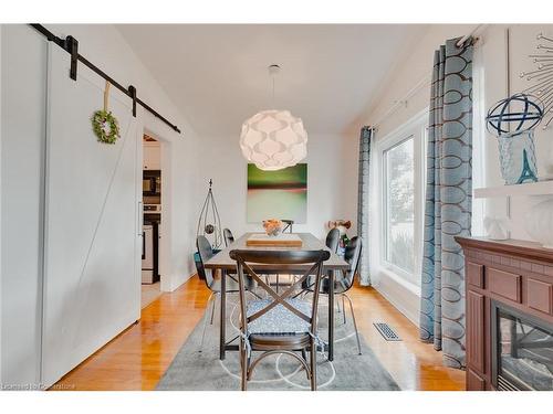 112 Buckingham Drive, Hamilton, ON - Indoor Photo Showing Dining Room With Fireplace