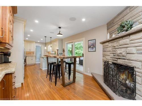 12596 22Side Road, Halton, ON - Indoor Photo Showing Dining Room With Fireplace