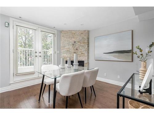 2002-12 Sudbury Street, Toronto, ON - Indoor Photo Showing Dining Room With Fireplace