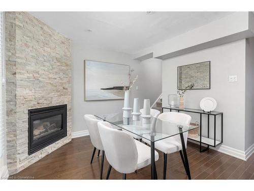 2002-12 Sudbury Street, Toronto, ON - Indoor Photo Showing Dining Room With Fireplace