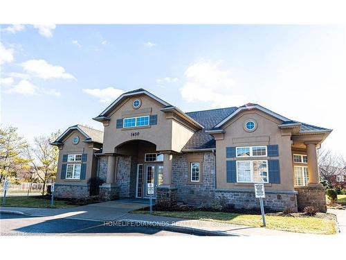 306-1450 Bishops Gate, Oakville, ON - Outdoor With Facade