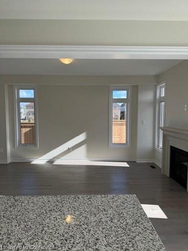 21 Molnar Crescent, Brantford, ON - Indoor Photo Showing Other Room With Fireplace