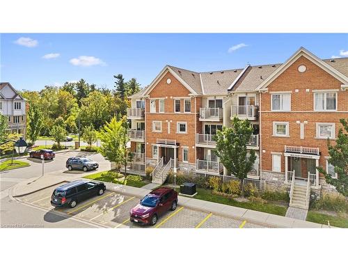 22-5625 Oscar Peterson Boulevard, Mississauga, ON - Outdoor With Balcony With Facade