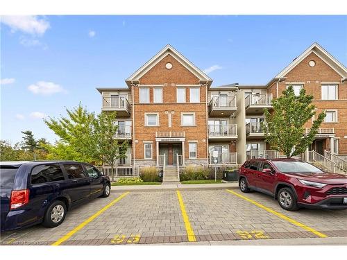 22-5625 Oscar Peterson Boulevard, Mississauga, ON - Outdoor With Balcony With Facade