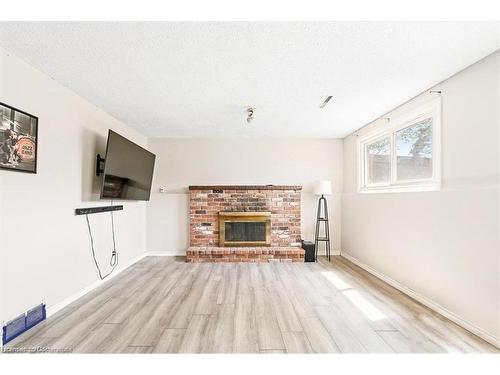 2 1/2 Leaside Drive, St. Catharines, ON - Indoor Photo Showing Living Room With Fireplace