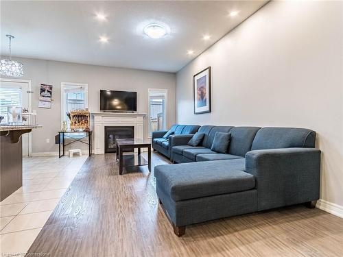 61 Sonoma Valley Crescent, Hamilton, ON - Indoor Photo Showing Living Room With Fireplace