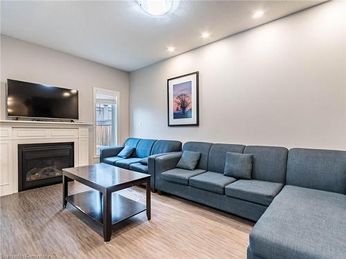 61 Sonoma Valley Crescent, Hamilton, ON - Indoor Photo Showing Living Room With Fireplace