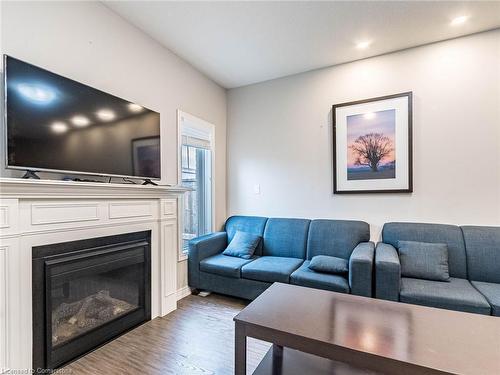 61 Sonoma Valley Crescent, Hamilton, ON - Indoor Photo Showing Living Room With Fireplace