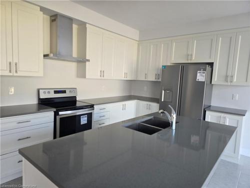 813 Knights Lane, Woodstock, ON - Indoor Photo Showing Kitchen With Double Sink