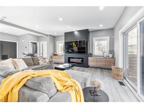 11 Joliet Crescent, Tiny, ON - Indoor Photo Showing Living Room With Fireplace