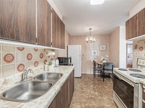 1204-61 Richview Road, Toronto, ON - Indoor Photo Showing Kitchen With Double Sink