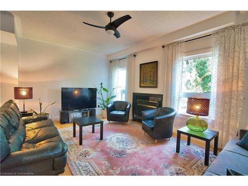 491 Pettit Trail, Milton, ON - Indoor Photo Showing Living Room With Fireplace