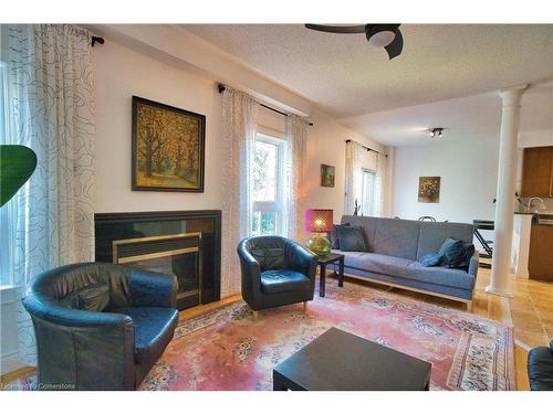 491 Pettit Trail, Milton, ON - Indoor Photo Showing Living Room With Fireplace